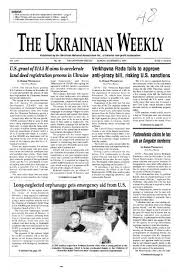 Ukrainian table bible leather red soft cover, indexes 30x21cm 2.2kg new box. 48 December 2 2001 The Ukrainian Weekly