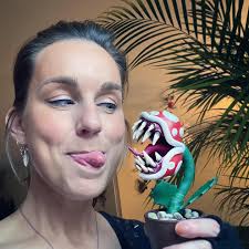 I made my own version of the Piranha Plant from Nintendo Super Mario Bros.  I sculpted this fellow in clay and painted him with Vallejo.