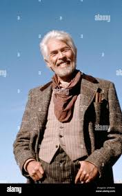 JAMES COBURN in YOUNG GUNS II (1990), directed by GEOFF MURPHY. Copyright:  Editorial use only. No merchandising or book covers. This is a publicly  distributed handout. Access rights only, no license of