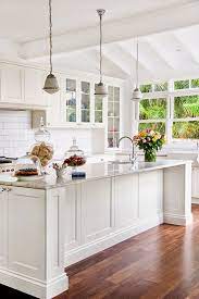 Especially if you're decorating a scandinavian or midcentury modern kitchen, playful pops of blue, yellow or red can bring a welcome contrast to white. Gorgeous Modern Cottage Kitchen Ideas 30 Decomagz Shaker Style Kitchen Cabinets Cottage Kitchens Shaker Style Kitchens