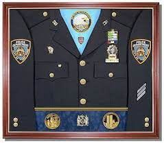 Police, firefighter emt shadow boxes often include an american flag, and may also hold their service weapon, badges, ranks, challenge coins, citations, and photos. Pin By Barry Sullivan On My Stuff Shadow Box Shadow Box Display Case Police Shadow Box Ideas