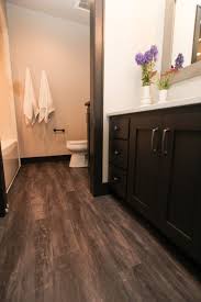 Dark Luxury Vinyl Plank Bathroom Floor In 2020 Luxury Vinyl Plank Flooring Vinyl Plank Flooring Bathroom Luxury Vinyl Plank Bathroom