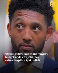Despite an $85 million city deficit, Baltimore Mayor Brandon Scott's final  fiscal 2026 budget found funds for 271 more full-time positions and  accounts for some big paydays recently inked by city leaders.