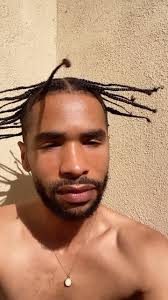 Tall Black Man with Braids