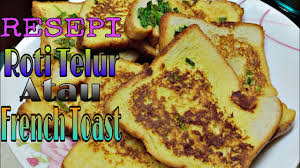 Pieces of sourdough bread covered in an egg mixture, topped with cinnamon sugar. Resepi Roti Telur French Toast Youtube