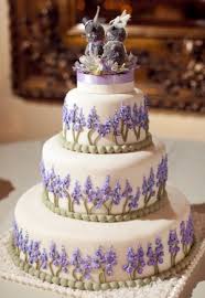 Lavender cakes made 2 cakes, each with a bunting theme, for a joint 50th birthday celebration. The Lavender Motif Of This Cake Is A Perfect Way To Match With A Purple Wedding Theme Lavender Wedding Cake Bee Wedding Cake Wedding Cakes With Cupcakes