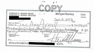 Dollars one thousand three hundred and three and cents fifty three only. Harold Hamm S Wife Cashes 975m Check After All Abc News