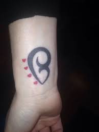 Mother and children tattoo symbol. 37 Mom Tattoos That Will Fill Your Heart