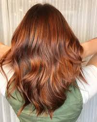 Golden copper hair is a pale copper red color often revved up with lighter babylights that blend effortlessly for a warm hair color that borders on the edge of rose gold. Golden Copper Hair Color Pictures Novocom Top