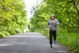 Runner Man Running On Road Training Sprint Sporting Male Run Working Out Outsid Sponsored Road Training Running Man Running Endurance Workout Workout