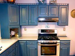 It will help cover any brushstrokes that may have ended up showing in the final paint job. Spray Painting Kitchen Cabinets Pictures Ideas From Hgtv Hgtv