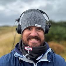 Every professional sports broadcast always talks about how powerful silence  is to hear crowds/players/etc to build drama. Rory coming. Scottie with  some shaky irons/putts early. NBC: F**k it, send McGinley in and