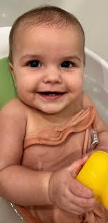 9 month old baby's adorable pink dress photoshoot