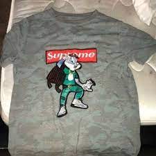 Bugs is best known for his starring roles in the looney tunes and merrie melodies series of animated short films, produced by warner bros. Supreme Tops Supreme Bugs Bunny Shirt Poshmark