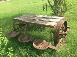 Rustic Wagon Wheel Wood Picnic Table With Tractor Seats For When We Move Down South Outdoor Living Old Farm Equipment Garden Picnic Table