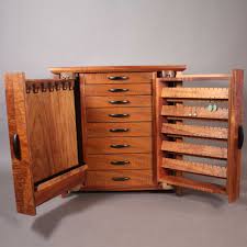 A cabinet member/a member of the. Koa Jewelry Cabinet With Necklace And Earring Storage