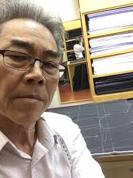 Master tailor Robert. Chow