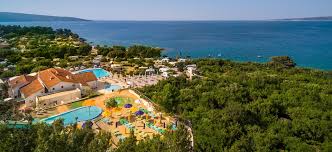 Swimming, water sports, food and drink, watching the sunset. Krk Premium Camping Resort By Valamar Krk Kroatien
