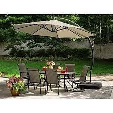 Garden Oasis 11 5 Ft Steel Round Offset Umbrella W Sand Base Patio Outdoor Patio Umbrellas Patio Umbrella