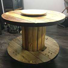 A spool table serving as a coffee table. Upcycled Wooden Spool Dining Table Furniture Home Living Furniture Tables Sets On Carousell