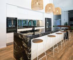 Thoroughly clean and wipe dry all of your kitchen cupboards with tile and laminate cleaner. 75 Beautiful Kitchen With White Cabinets And Black Benchtop Ideas Designs July 2021 Houzz Au