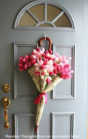 12 Beautiful Decorations To Hang On Your Door That Aren T Wreaths Spring Decor Umbrella Wreath Door Decorations