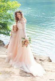 This peach colored wedding dress is the perfect choice for brides who don't want a traditional bridal gown. Papilio 2017 Wedding Dresses Wings Of Love Bridal Collection Wedding Inspirasi Winter Wedding Dress Wedding Dresses Lace Wedding Dresses