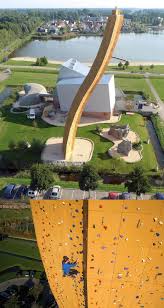 Excalibur Climbing Wall Towering Over 121 Feet At The Klimcentrum Bjoeks In Netherlands Rock Climbing Wall Climbing Wall Rock Climbing