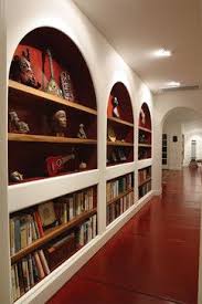 Spanish Mediterranean Built Ins For Kitchen Built In Bookcase Bookshelves Built In Arched Doors