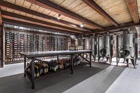 The wine cellar pod lid makes this underground wine cellar a superb wine storage solution and feature in your home, with philips led lighting you can see the 112 wine bottles in the chrome wine racks. Vineria Wine Cellar By Ns Studio