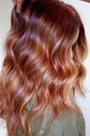 15 Winter Hair Colors We Re Swooning Over Already Red Balayage Hair Winter Hairstyles Winter Hair Color Trends