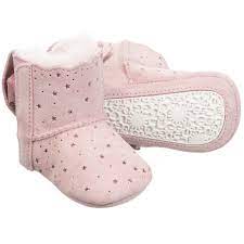 Adorable For Baby Girls A Pink Pair Of First Walker Boots By Ugg Australia With A Metallic Stars Pattern Made F Walker Boots Baby Girl Boots Cute Baby Shoes