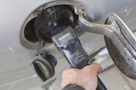 Whether you drive a little or a lot, saving money on gas can make you feel like a champion. A Gas Pump Inserted Into A Vehicle Fuel Tank Opening Stock Photo Picture And Royalty Free Image Image 20432526