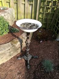 Bird Bath Ideas For Cages Diy Bird Bath I Found The Cast Iron Table Stand And Bowl On A Local Flea Market I Glued Them Together With Construction Glu Diy Bird Bath Bird Bath Diy Birds