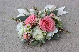 Wrist Corsage White Ranunclus Pink Spray Roses White Wax Flower Seeded Eucalyptus Feather Acacia On A Satin Ribbo White Wax Flower Spray Roses Wax Flowers