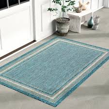 A deep navy that's practically neutral, this beautifully minimal rug feels subtle in its design and bold in its coloring. Best Outdoor Rugs Popsugar Home