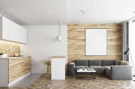 Auch die optisch aufhellende und raumvergrößernde wirkung, macht weiße wandfliesen zu einer beliebten wahl in küche, bad oder hauswirtschaftsraum. Wohnzimmer In Einem Studio Apartment Mit Holz Und Weissen Wanden Holzboden Und Fliesen In Der Nahe Von Arbeitsplatten In Der Kuchenecke Bartisch Mit Hockern Vertikales Plakat 3d Rendering Mock Up Lizenzfreie Fotos Bilder Und Stock