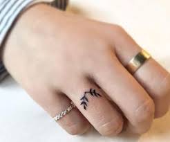 Couples can have wedding rings inked on the event of their engagement or wedding ceremony, alongside their names or initials, or even their wedding pledges. A Thin Tattoo On The Ring Finger Blurmark