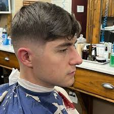 Barry Letour, our new barber at the Ansley location, is KILLING IT. Low  skin fade with a long top offers great contrast and versatile styling  options. Perfection. . #atlantabarber #menshair #menshaircut #barbershop #