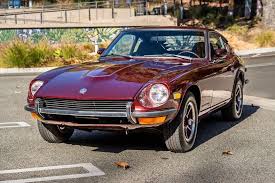 Image result for Maroon 1959 Datsun