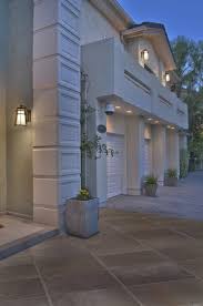Exterior lighting is both functional and a way to add to the curb appeal of your home. Expert Over Garage Door Lighting Tips