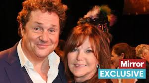 Music legend Michael Ball dedicates his first novel to partner Cathy  McGowan