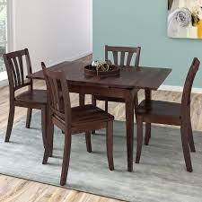 The room style 7 piece cherry finish solid wood dining table set. Corliving Dillon 5 Piece Extendable Cappuccino Stained Solid Wood Dining Set The Home Depot Canada