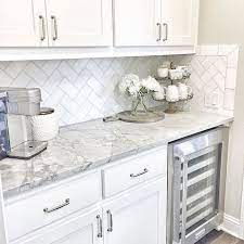 Black quartz countertops with white cabinets provide another timeless, chic look for any household kitchen out there. Pin On Home Decor