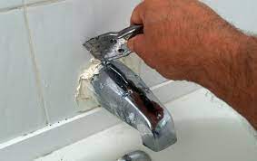 It is a small plastic flap. How To Replace A Tub Spout Project Tutorial Bob Vila