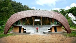 This Community Centre Designed By 1 1 2 Architects In Vietnam Features A Bamboo Framework And Thatched Roof That Shel Community Housing Architect Thatched Roof