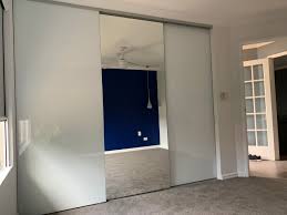 Choice of mirror, opaque frosted glass or colored glass inserts. Sliding Wardrobe Doors Frameless The Wardrobe Man