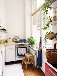Go minimalist with wide, white cabinetry with pops of chrome. Cozy Kitchen Scandinavian Interior Design Novocom Top