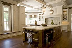 This blue and white modern cottage kitchen has white painted cabinets, blue work island, and mosaic tile cooktop backsplash. Oprah S New House Home Bunch Interior Design Ideas