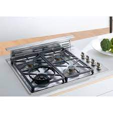 Flex induction cooktops with integrated ventilation system; Remodeling 101 Nearly Invisible Downdraft Kitchen Vents Remodelista